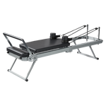 Foldable Pilates Reformer Machine by Online Fitness Depot for yoga and Pilates workouts, featuring a compact design and adjustable resistance.