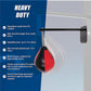 Speed bag boxing punching bag wall mount for reflex training, used in boxing and martial arts workout routines.