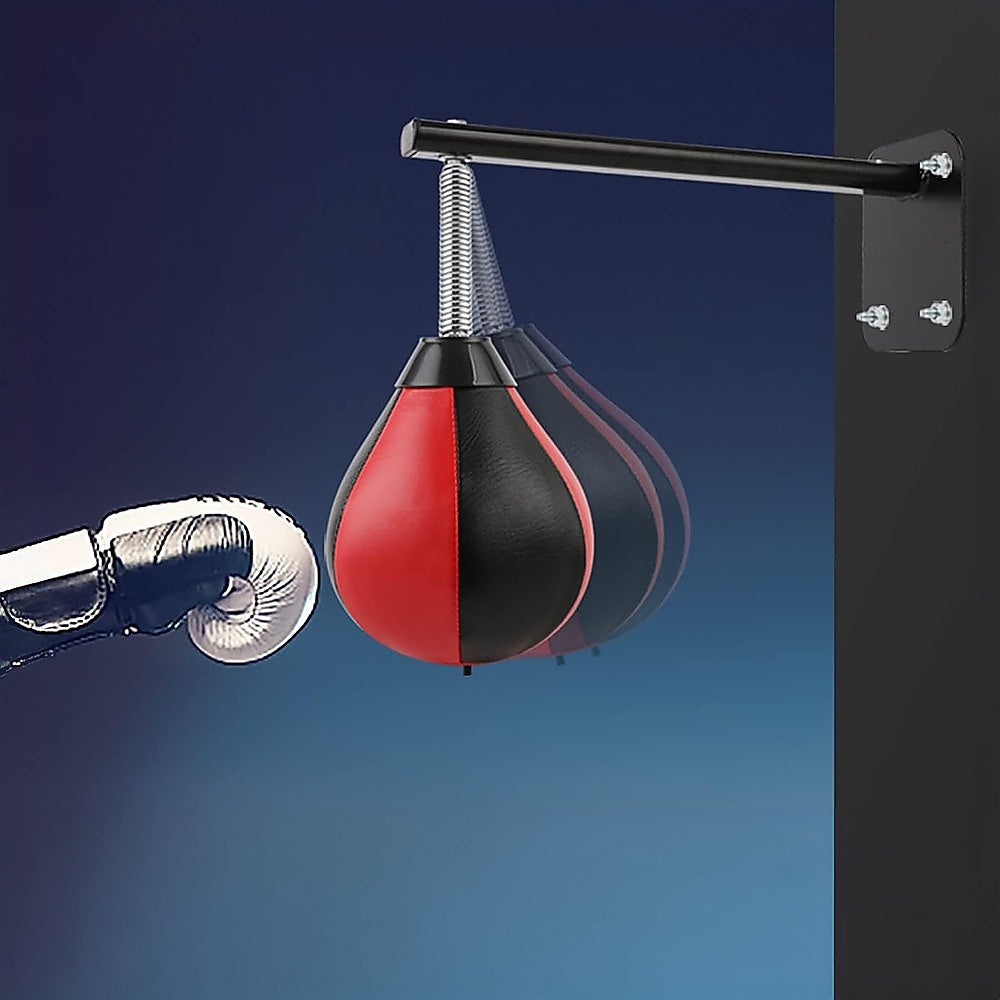 Speed bag boxing punching bag wall mount for reflex training, shown attached to a gym wall with a focus on the sports and fitness equipment.