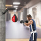 Speed bag punching boxing bag wall mount for reflex training, used in boxing and martial arts workouts.