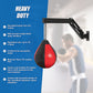 Speed bag punching boxing bag wall mount for reflex training, shown mounted on a wall in a gym setting.