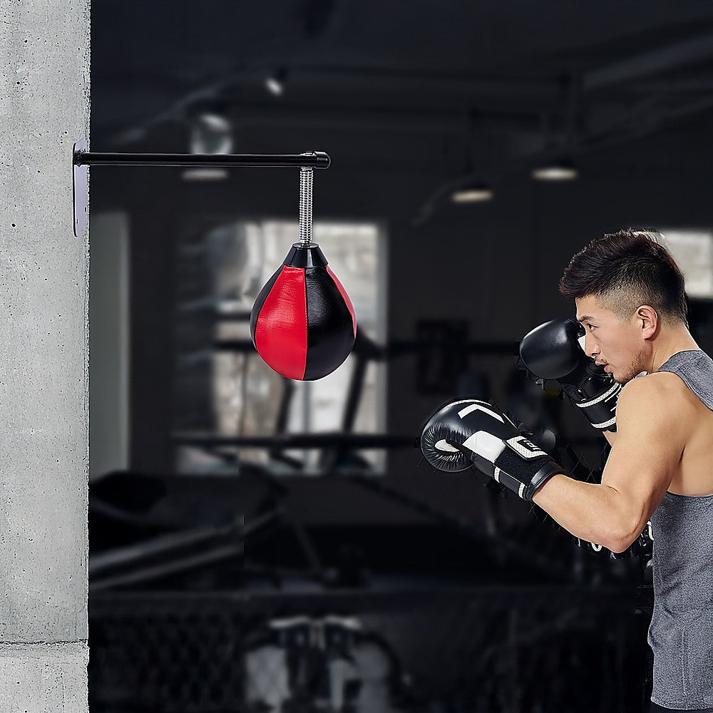 Wall hanging boxing punching bag speed training stress relief kit with wall mount bracket, suitable for boxing and fitness workouts.