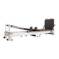Folding Pilates Reformer machine by Online Fitness Depot, compact home workout bed for full-body yoga and Pilates exercises.