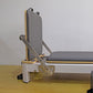 Folding Pilates reformer machine for full-body fitness training, with padded carriage and adjustable resistance for home workouts.