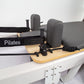Folding Pilates Reformer Machine from Online Fitness Depot for full-body home workout and fitness training.