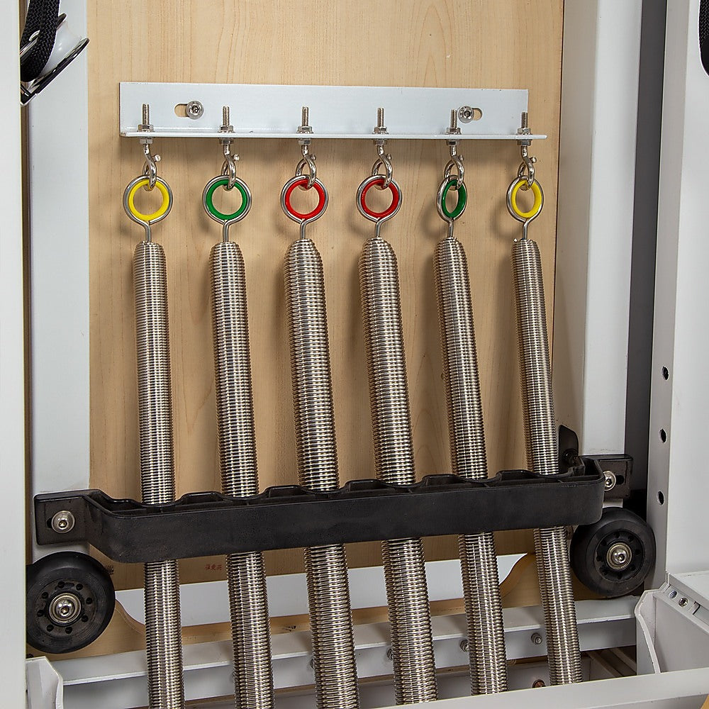 Folding Pilates reformer machine from Online Fitness Depot, designed for full body home fitness and yoga exercises.