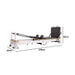 Folding Pilates Reformer machine by Online Fitness Depot with padded carriage, adjustable straps, and compact design for full-body workouts.