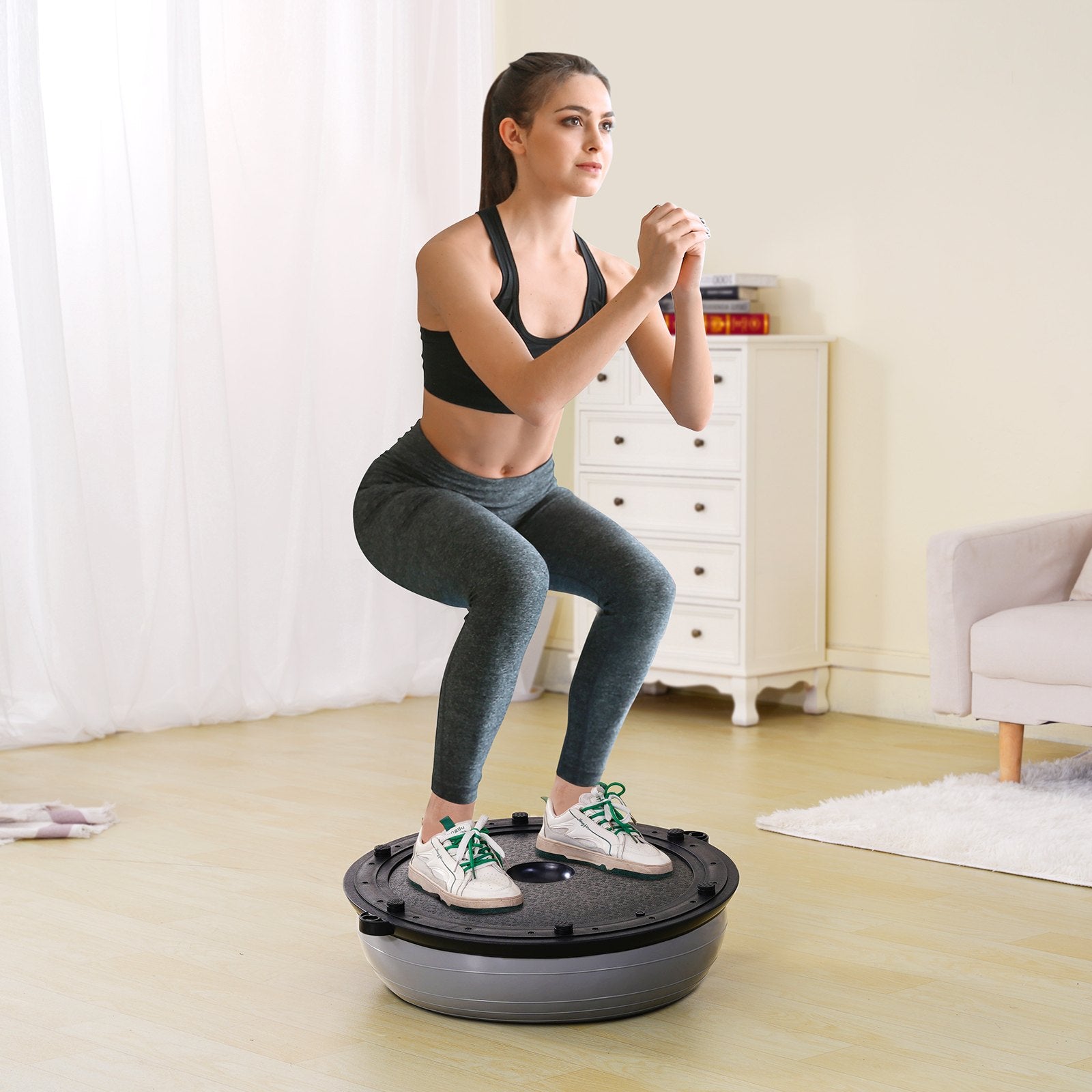 Gray 23-inch fitness stability ball with resistance bands and foot pump, ideal for full body workouts and home gym exercises.