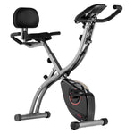 Foldable VEVOR exercise bike with adjustable magnetic resistance, comfortable seat, LCD monitor, ideal for indoor home gym workouts.