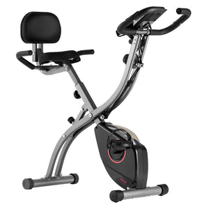 Foldable VEVOR exercise bike with adjustable magnetic resistance, comfortable seat, LCD monitor, ideal for indoor home gym workouts.