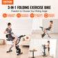 Foldable VEVOR exercise bike with adjustable magnetic resistance, LCD monitor, comfortable seat, and upright design for home gym workouts.