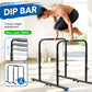 Set of two adjustable fitness dip bars from Online Fitness Depot for strength training and calisthenics in home gym.