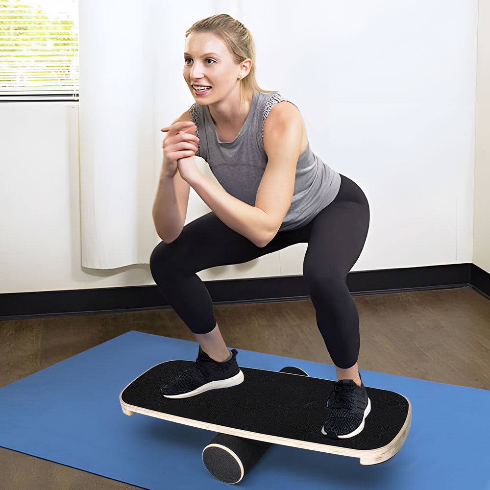 Wooden balance board with non-slip roller for core stability, ideal for snowboard, skateboard, surf, yoga, and fitness training.